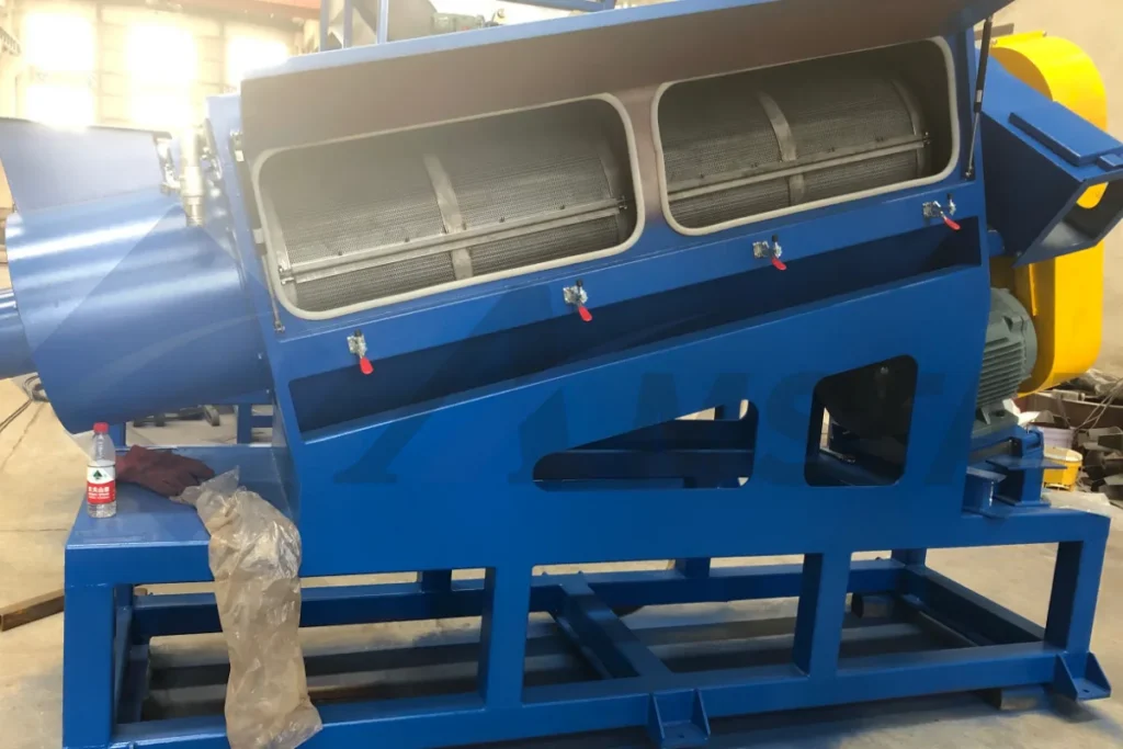 High speed friction washer with its access doors open, showing the mesh screen drums