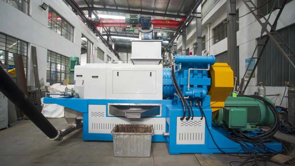 Screw press squeezer that dewaters and densifies washed PE film