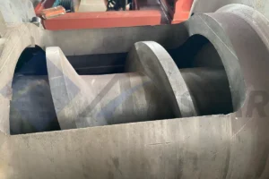 Close-up of the screw press squeezer’s screw inside the barrel